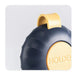 Black and gold object with 'HOLDER' branding on a light gray background