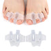  Digital Shoppy three‑hole toe separator worn on feet showing translucent and beige color options