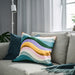 IKEA MYGGBLOMSTER cushion cover with multicolour wavy stripes on grey-blue base, styled on sofa in cozy, modern living room setup – 50582133