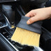 Digital Shoppy cleaning brush used on car gear shift panel removing dust
