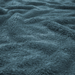 Close-up of IKEA TRATTVIVA blue fleece fabric showing thick plush texture