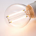 Close-up of a light bulb with a soft focus background
