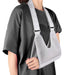 Ergonomic shoulder and arm jib brace for pain relief, rotator cuff support, and mobility assistance.
