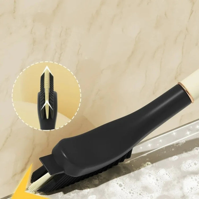 Cleaning tool with a close-up of its head on a tiled floor.