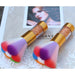  Set of colorful acrylic nail brushes with nylon bristles arranged vertically