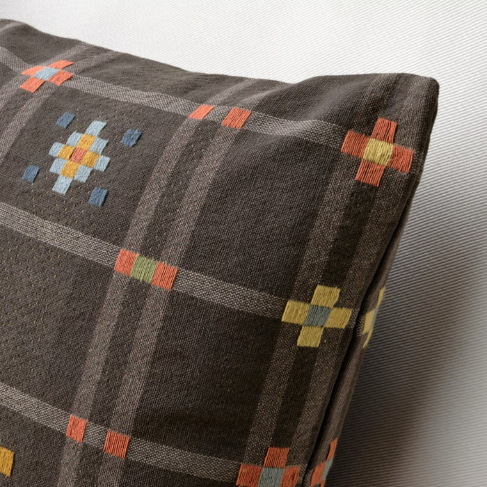 Textile with geometric pattern on a gray background