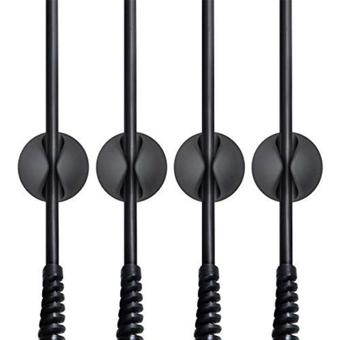Cable Organizer Clips – 5pcs Black TPR, Single-Hole Buckle Design, used to secure black cables on desk surface