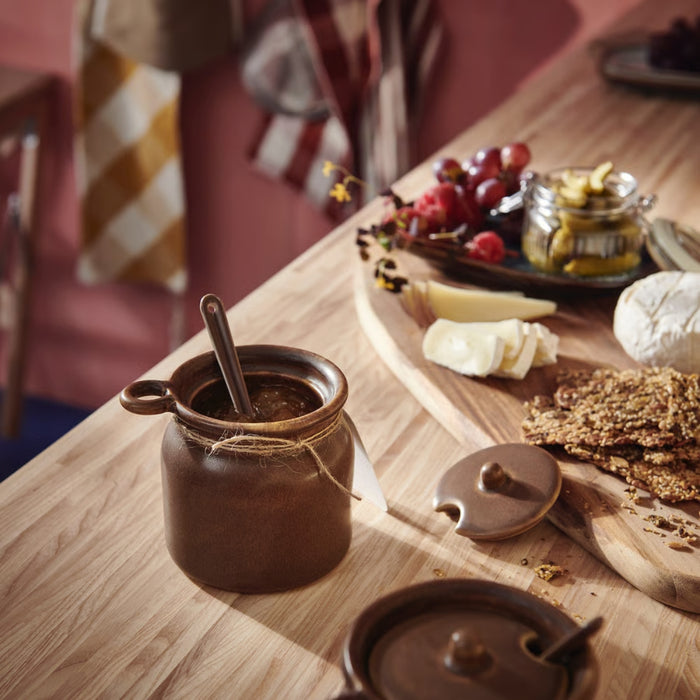 Compact IKEA KÖSSEBÄR storage jar with spoon and lid in brown