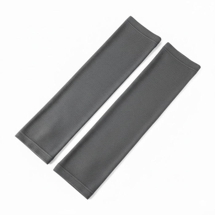 Pair of dark gray breathable ice sleeves laid flat, showcasing lightweight mesh texture and ergonomic cut