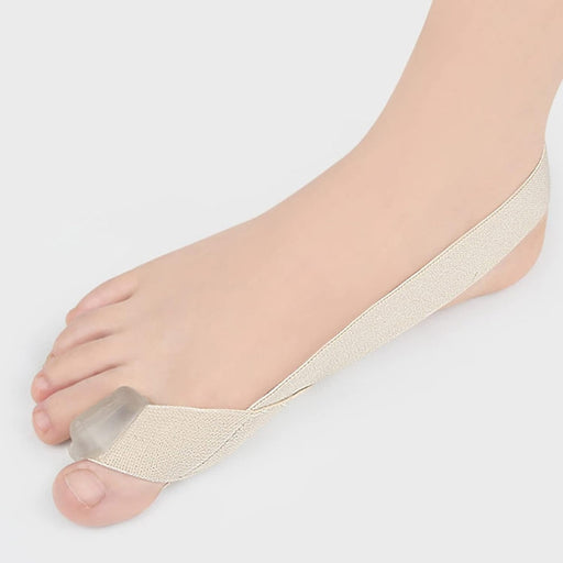 Close-up of a foot wearing the elastic cloth toe separator highlighting the comfortable gel spacer.