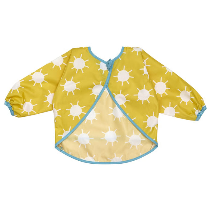 IKEA KLADDIG bib in yellow/white with long sleeves; features white sun pattern, blue trim, and front overlap with button closure – ideal for protecting toddlers’ clothes during feeding or messy play - 00607145