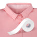 Close-up of a pink shirt with the invisible white collar liner applied to the inside neck area to prevent sweat stains.