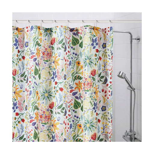 Floral patterned shower curtain in a bathroom setting