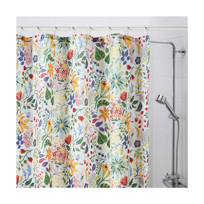 Floral patterned shower curtain in a bathroom setting
