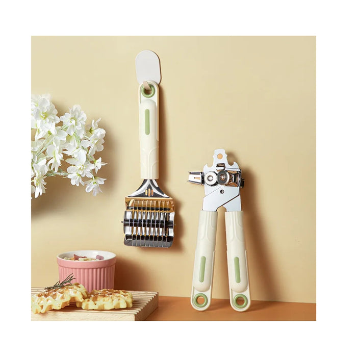 Two kitchen tools on a beige surface with a light background