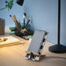 IKEA PLUGGLAND mobile phone stand holding a smartphone while charging