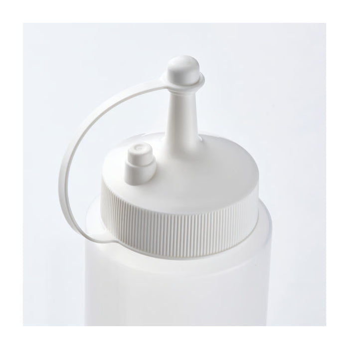 White squeeze bottle with pump on a light gray background