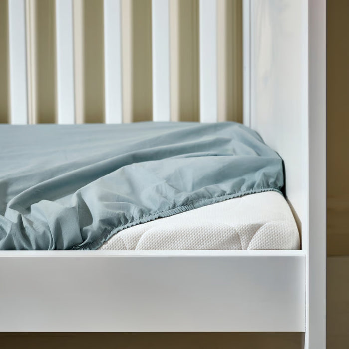 Soft cotton baby cot sheet from IKEA GULDVÄVARE collection