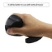 Hand gripping black vertical mouse with ergonomic wrist posture – caption recommends pairing with wrist rest for better comfort – 1598452347809 13936001