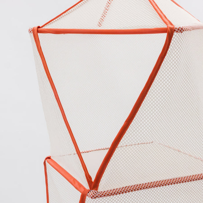 Geometric mesh chair with orange frame on a light gray background