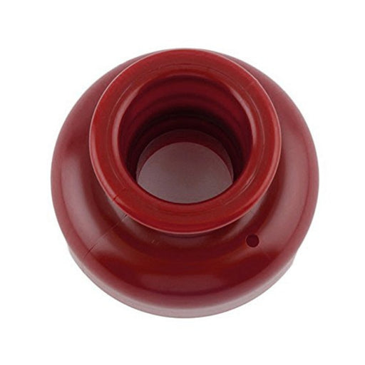 Red plastic donut cutter with central hole punch, designed for shaping classic donuts from dough with ease