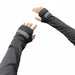 Pair of black breathable ice sleeves with thumb holes and reflective strips, laid flat to showcase ergonomic design