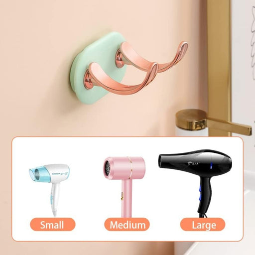 Wall-mounted hair dryer holder with three hair dryers labeled small, medium, and large.
