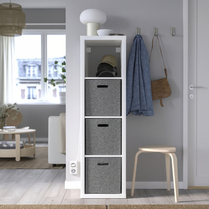 White storage unit with gray bins in a room with a window, chair, and stool.