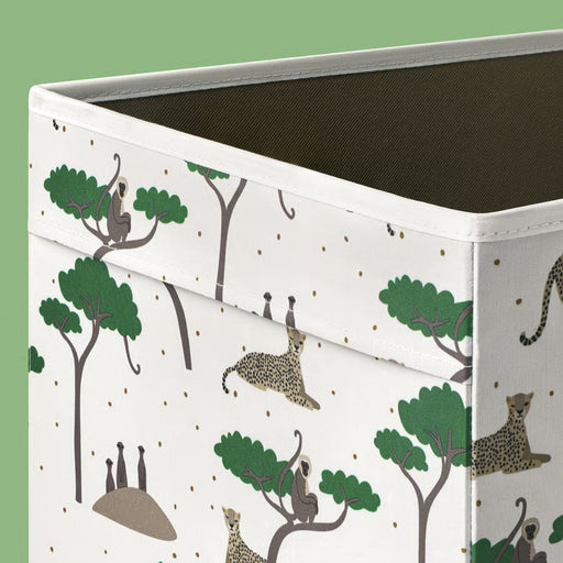Storage box with animal pattern on a green background