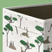 Storage box with animal pattern on a green background