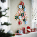 IKEA VINTERFINT wall decoration – pine rack used as festive advent calendar with gift bags and holiday setup - 30604937