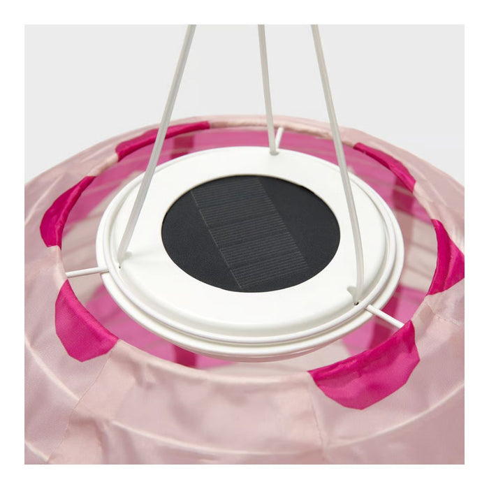 Solar panel with pink and white design on a clear background