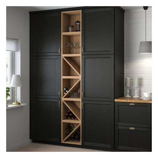 Black kitchen cabinet with wooden shelves containing wine bottles and glasses in a modern kitchen setting.