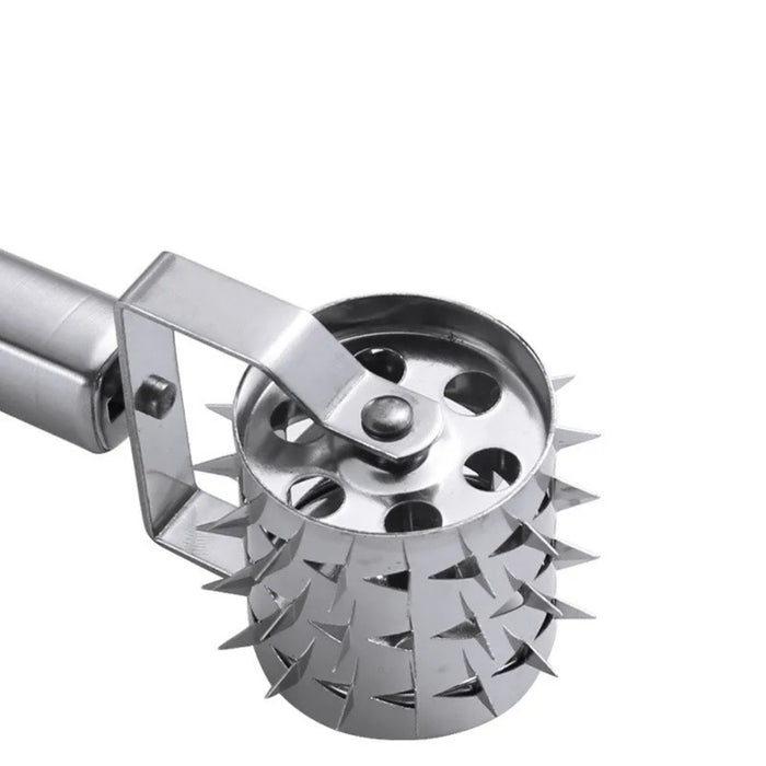 Metallic kitchen tool with spiky design on a white background