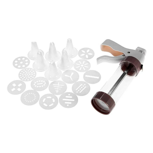 Cookie press with various press heads on a white background