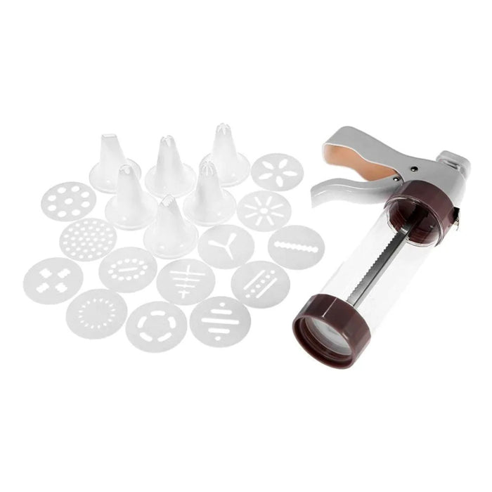 Cookie press with various press heads on a white background