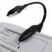 Black flexible reading light on a document
