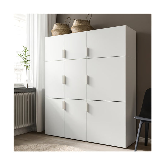 White storage cabinet with multiple doors in a room setting.
