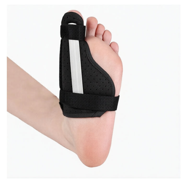 Black wrist support brace on a hand with a white background