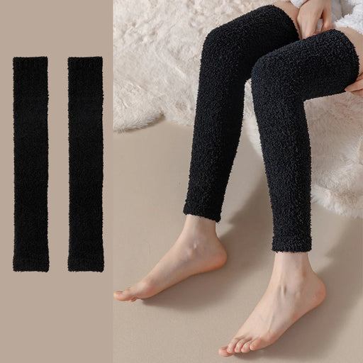 Black fuzzy leg warmers shown flat and worn, extending from ankle to above knee - 
