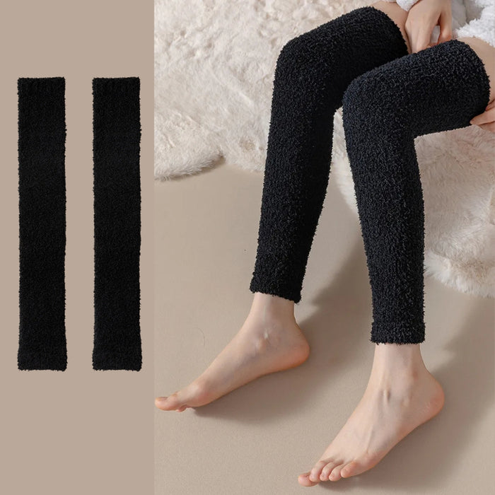 Black fuzzy leg warmers shown flat and worn, extending from ankle to above knee - 