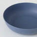 Blue ceramic bowl on a white background