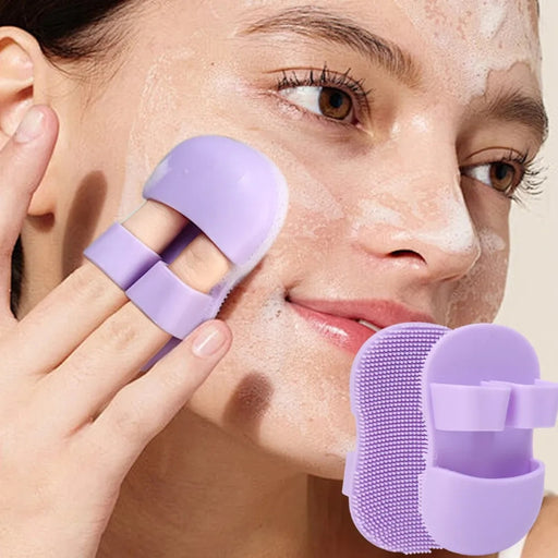 Purple silicone face and baby bath scrubber, 2pcs; mini finger glove with soft bristles – shown in use for gentle facial cleansing – ideal for sensitive skin – 860000022226113652836
