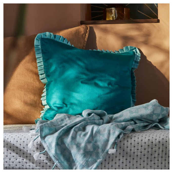 IKEA GOKVÄLLÅ Cushion cover, blue, 50x50 cm – teal ruffled pillow paired with geometric throw in sunlit, cozy setting – 60596120