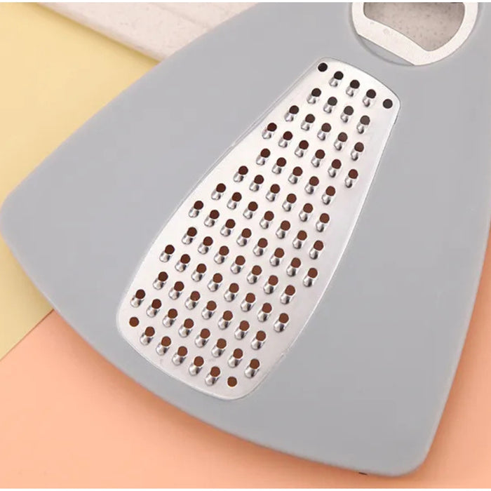 Gray grater with metal surface on a colorful background