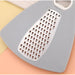 Gray grater with metal surface on a colorful background