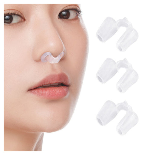 Woman wearing a clear nose ring with additional nose rings displayed on a white background