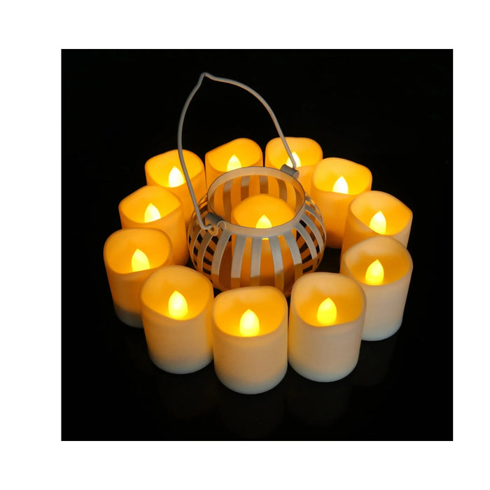 Set of lit candles around a lantern on a black background