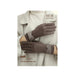 Brown gloves worn by a person on a white background with text about warmth and softness.