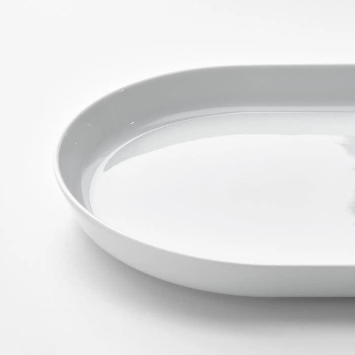 White ceramic plate on a light gray background